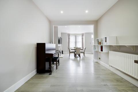 66 Faraday Road, London, SW19 8PD