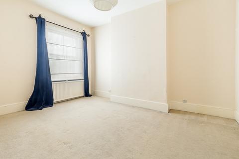 112 Gladstone Road, London, SW19 1QW