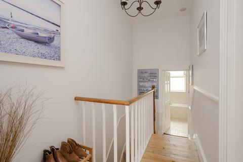23 Thornton Road, London, SW19 4NG