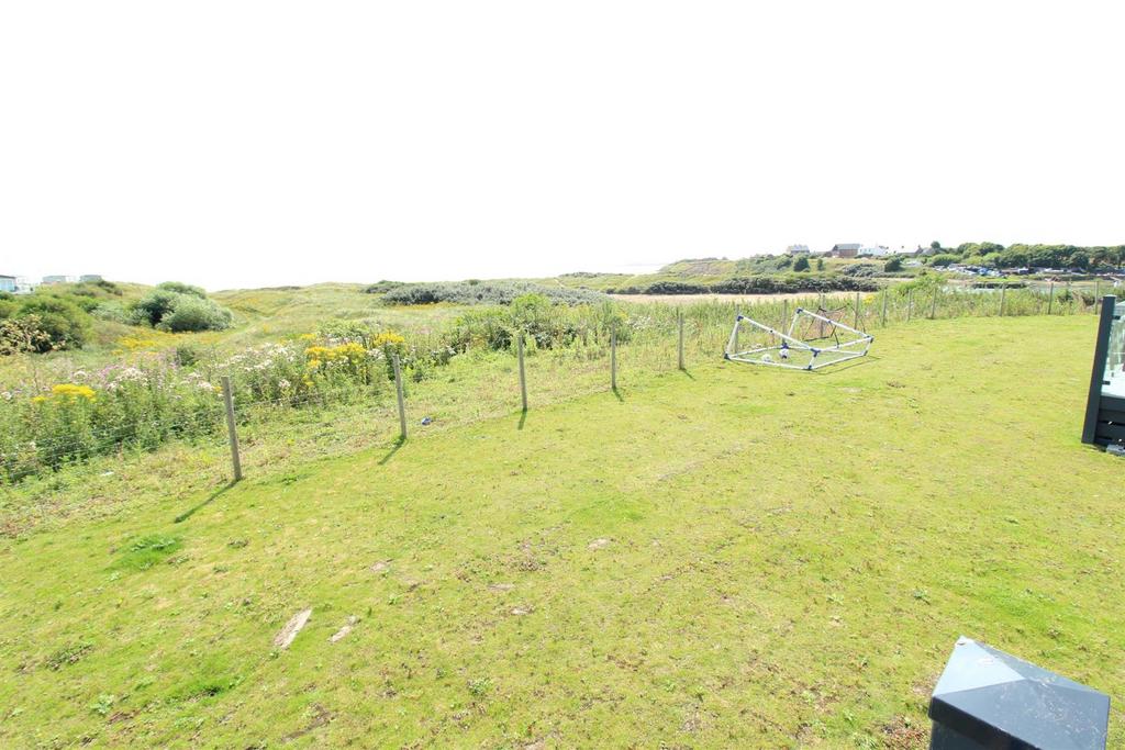 Views over open fields/beach