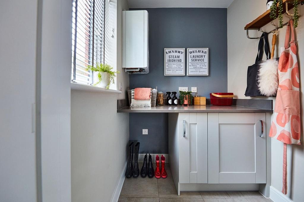 Useful utility room is located off the kitchen