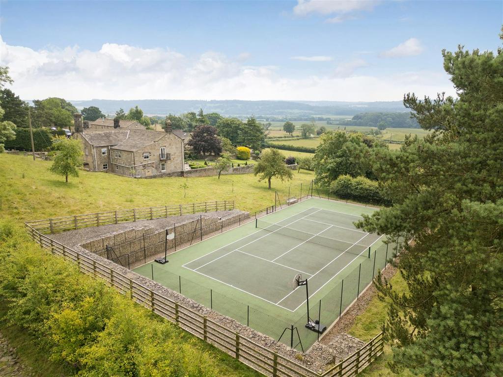 West elevation and tennis court