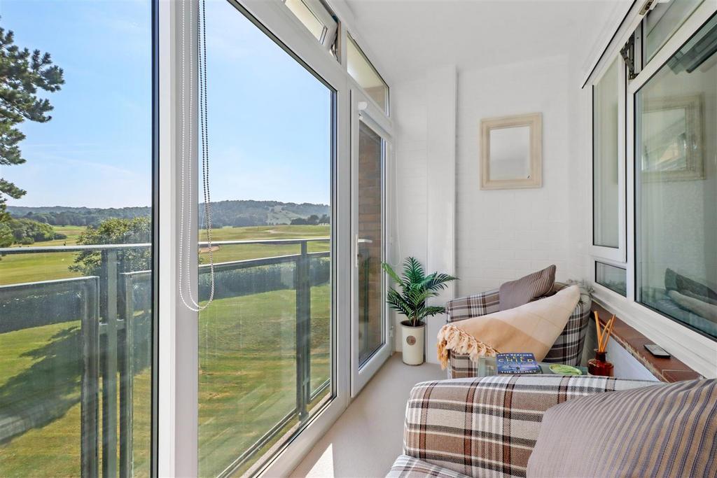 Enclosed Balcony with View Beyond