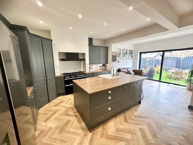 Open plan dining kitchen and family room