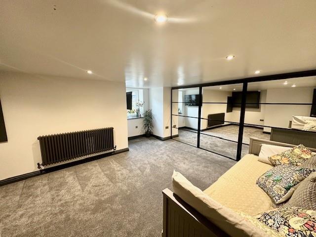 Basement sitting room/bedroom 5