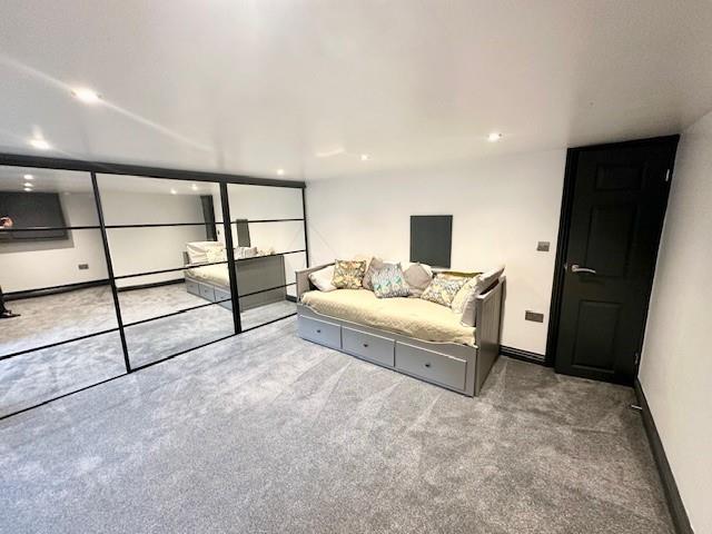 Basement sitting room/bedroom 5