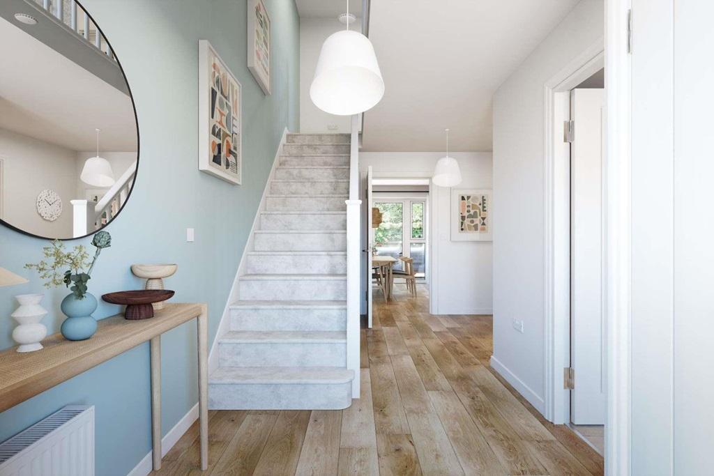 A welcoming hallway with cloakroom and storage...