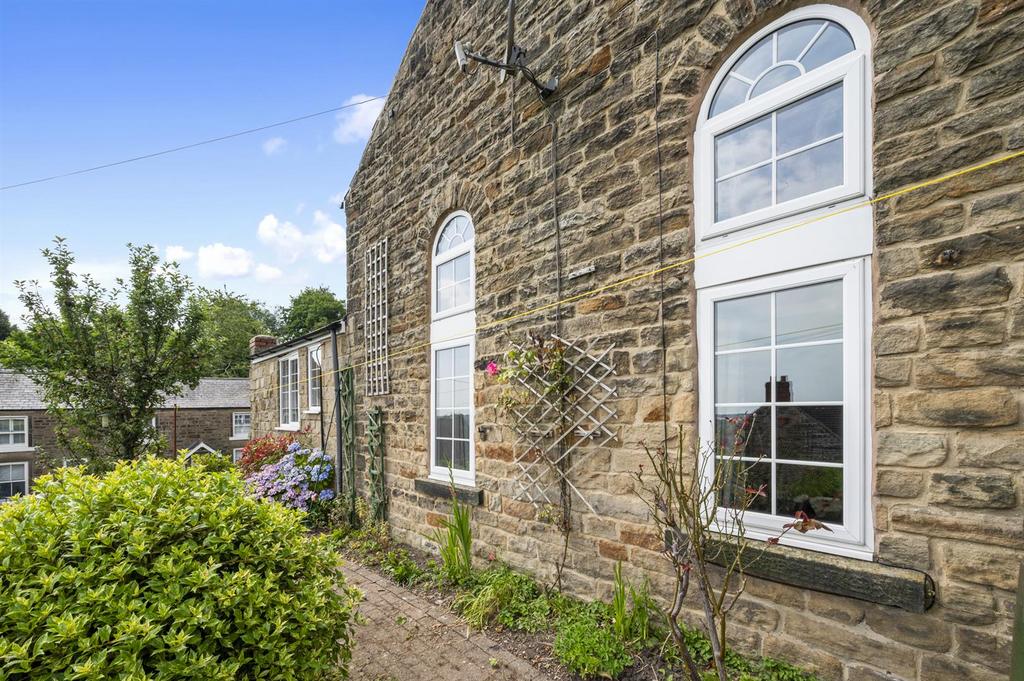 Exterior to sitting room and kitchen.jpg