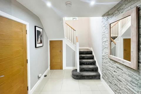 18 Bartley Road, Manchester, M22 4BG