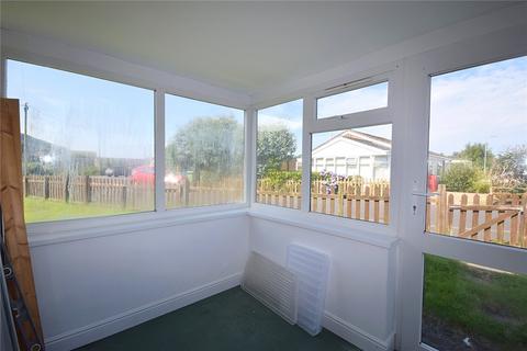 25 Glan Y Mor, Fairbourne, LL38 2BX