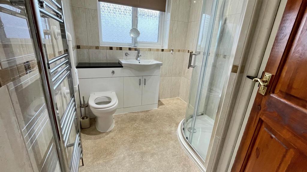 Ground floor tiled 3 piece shower room