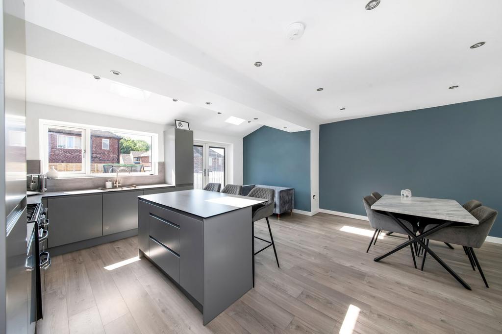 Open plan dining kitchen and family room