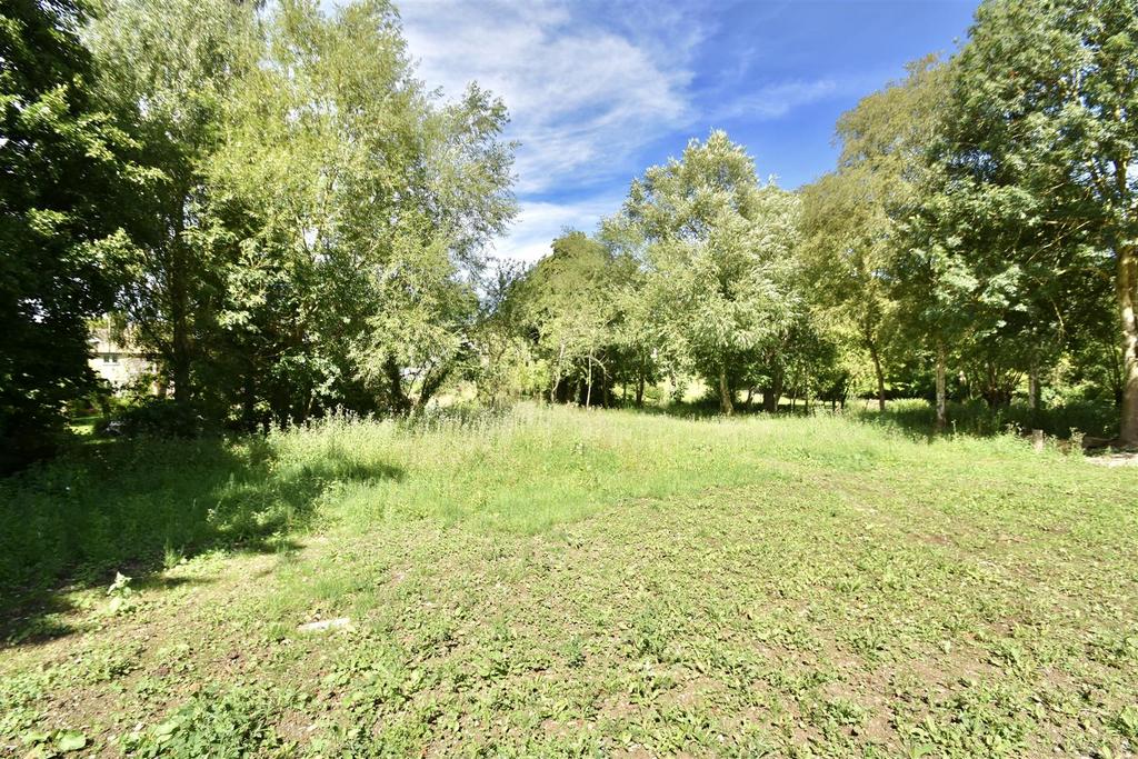 1/2 acre river frontage included!