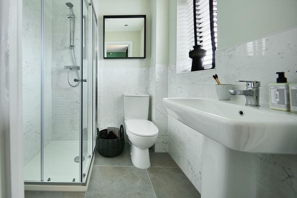 The main bedroom boasts its own en-suite shower...