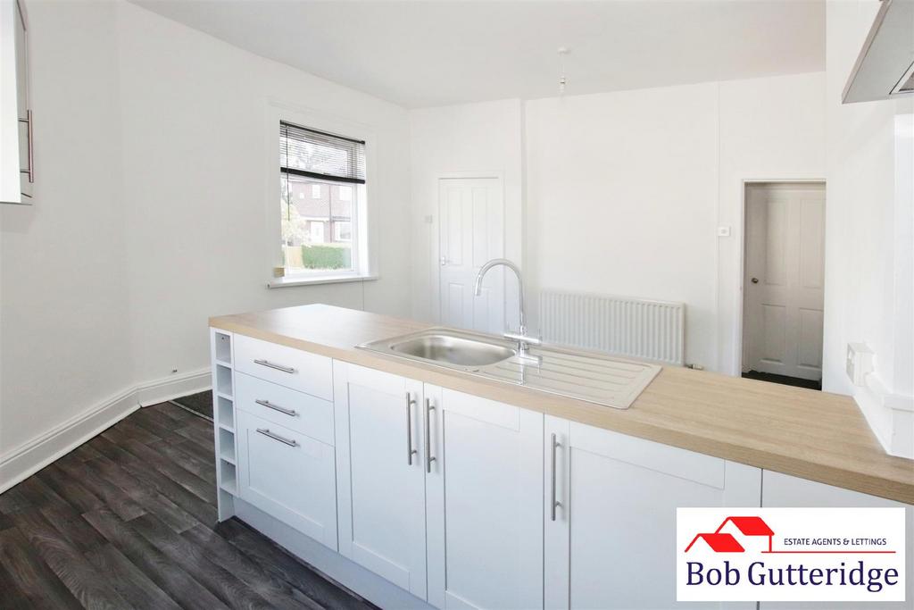 Open plan fitted kitchen/lounge diner