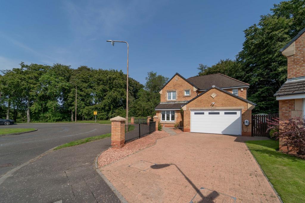 Front and Side Gardens and Double Garage