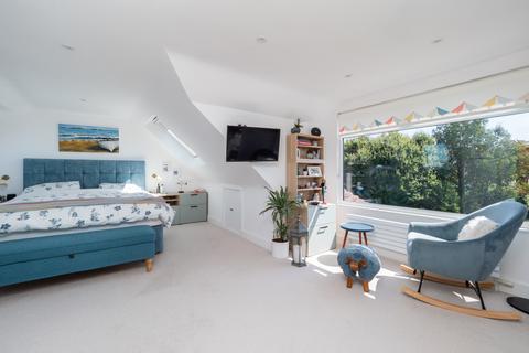 8 Ranmore Road, Sutton, SM2 7LT