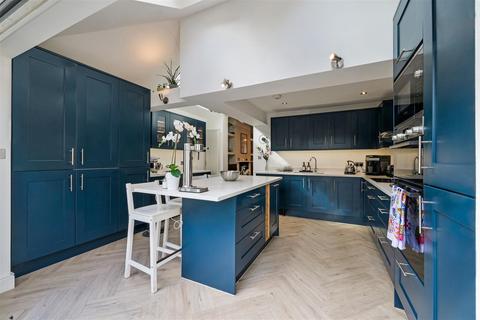 1 Gilbert Road, London, SW19 1BP