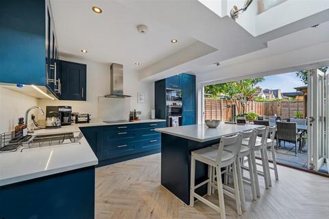 1 Gilbert Road, London, SW19 1BP