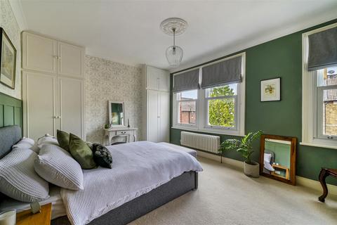 1 Gilbert Road, London, SW19 1BP