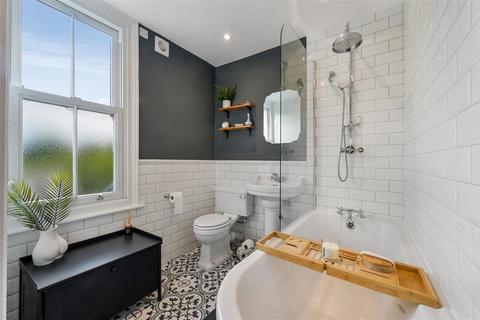 1 Gilbert Road, London, SW19 1BP