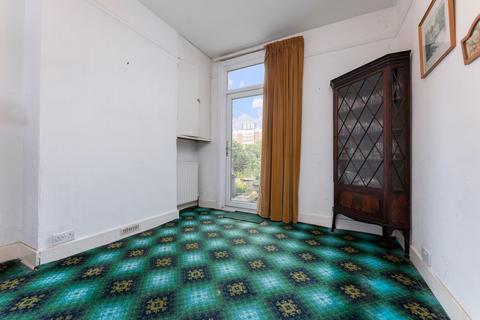 1 Croft Road, London, SW19 2NF
