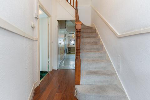 1 Croft Road, London, SW19 2NF