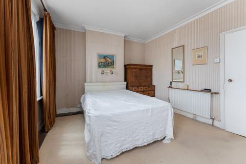 1 Croft Road, London, SW19 2NF