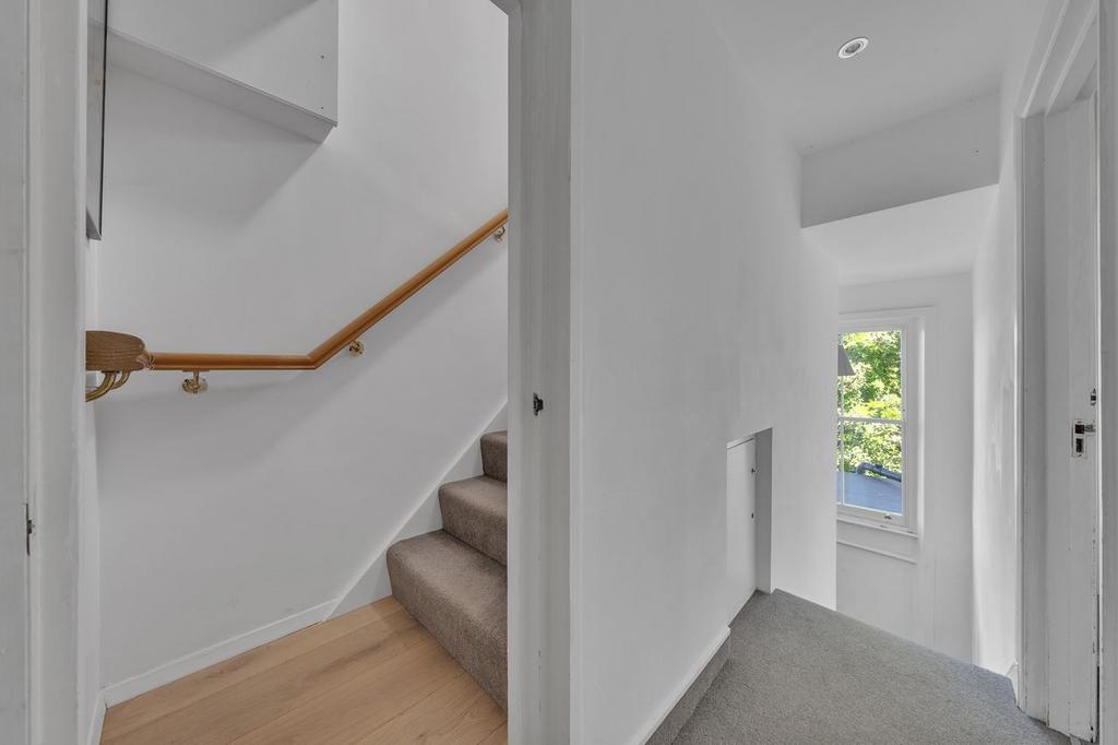 Staircase top floor reception/kitchen
