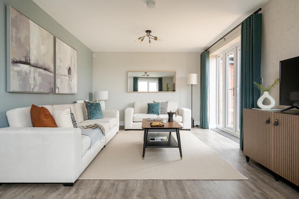 The lounge boasts French doors to the rear garden