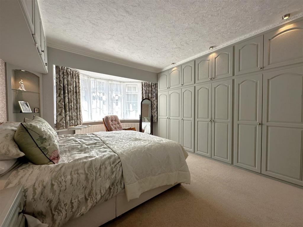 Bedroom One With Extensive Fitted Wardrobes 35