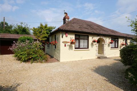 undefined, A spacious bungalow with large gardens and versatile living space.