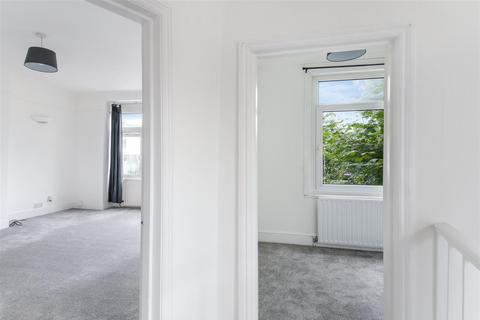 18a Lower Downs Road, London, SW20 8QF