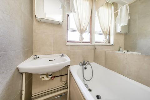 64 Keevil Drive, London, SW19 6TA