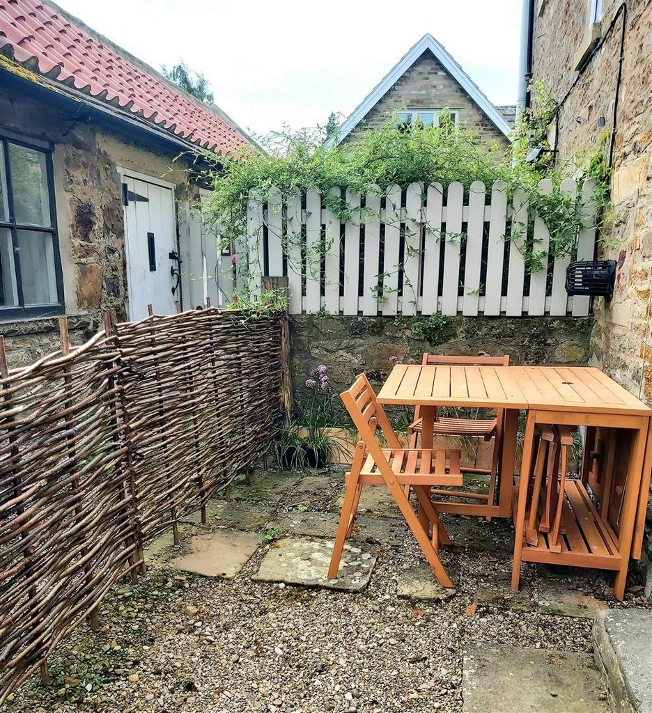 Rear courtyard with outbuilding.jpg