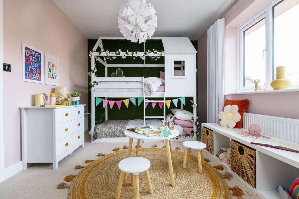 A second double bedroom overlooks the rear garden