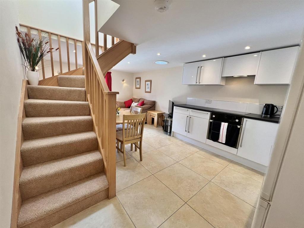 Open plan lounge dining kitchen area
