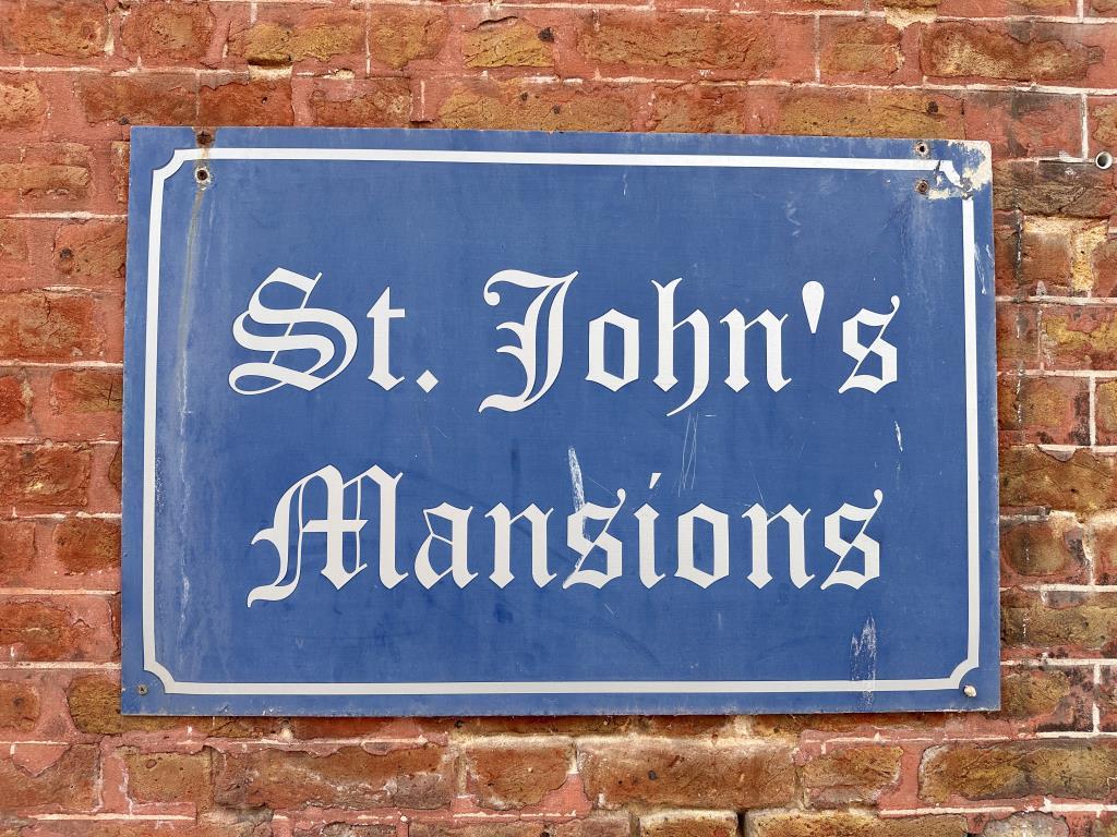 St Johns mansions name plaque