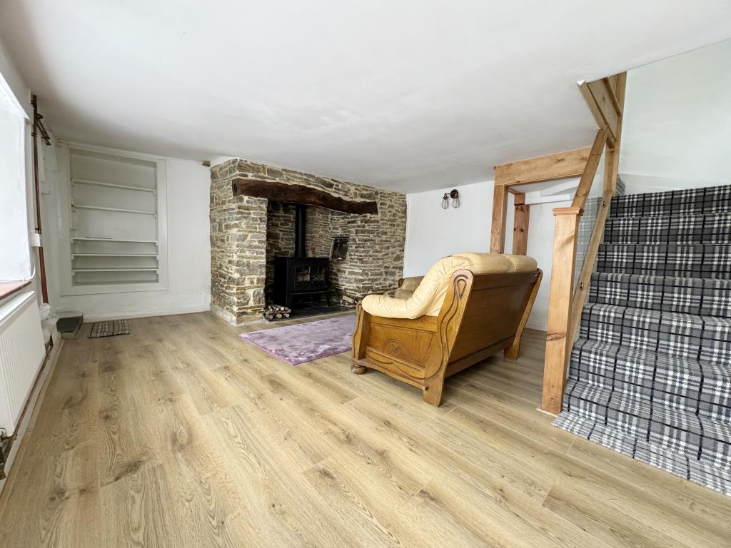 Sitting room with Inglenook fire place