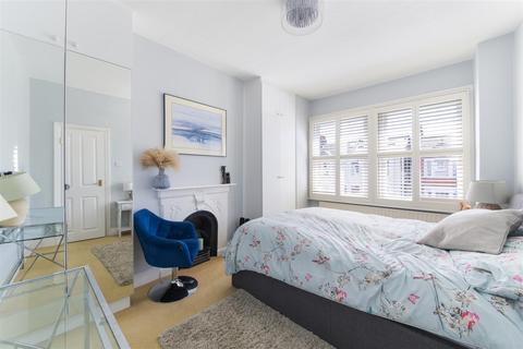 60 Faraday Road, London, SW19 8PD