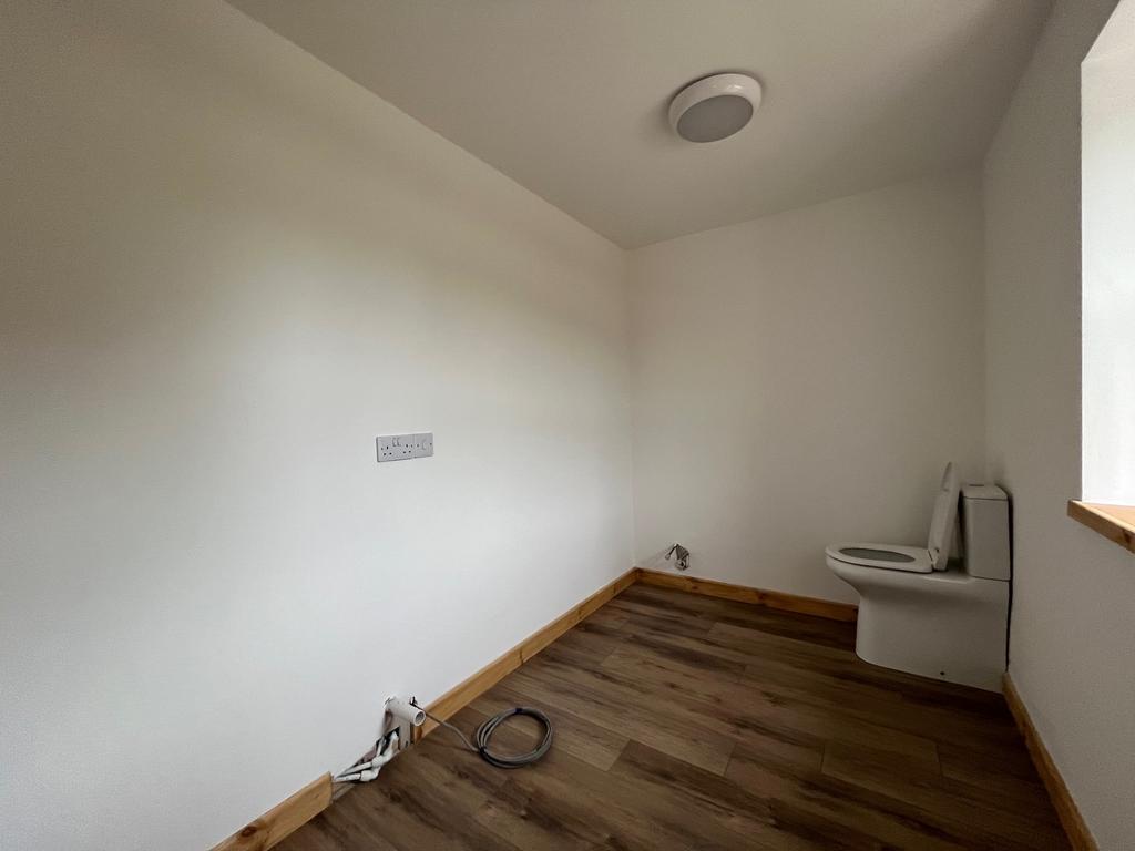 Utility Room/Downstairs Toilet