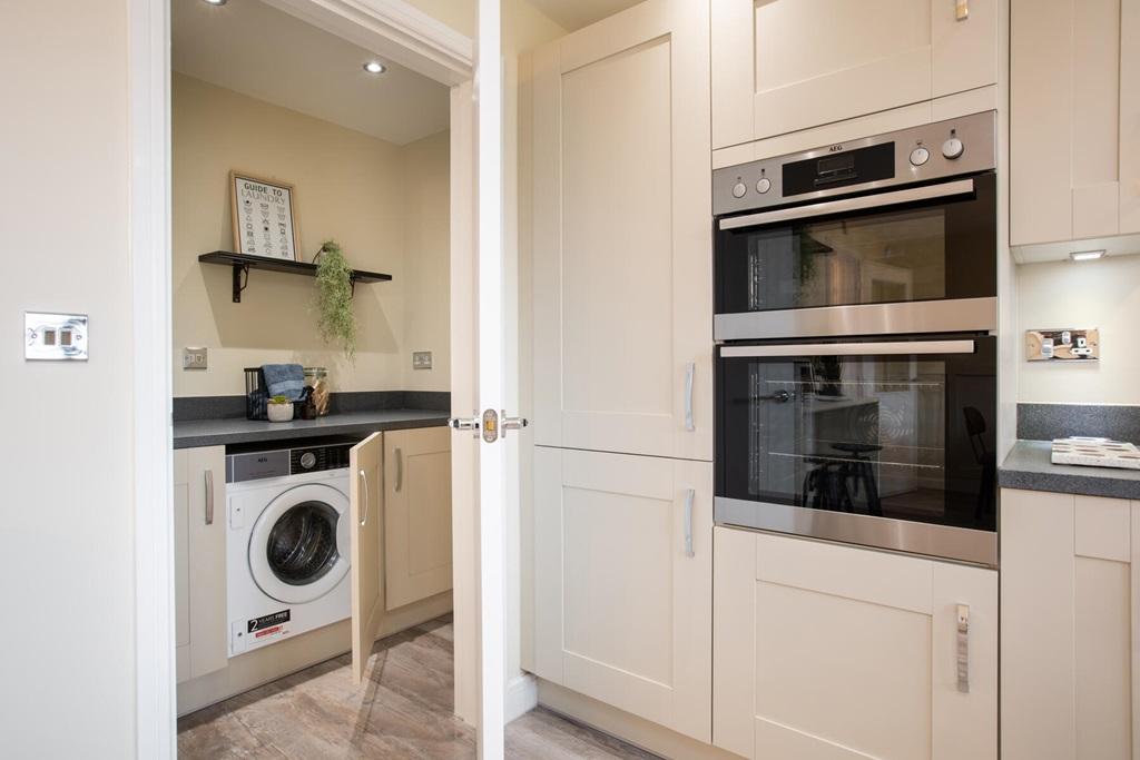 Handy utility room with laundry space