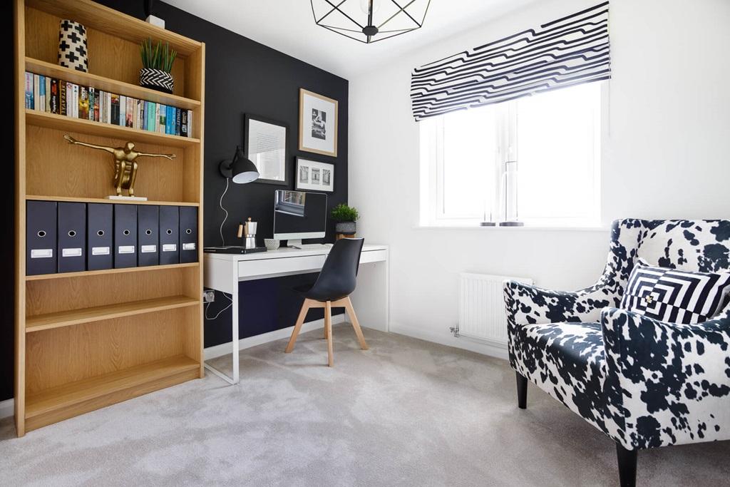 Bedroom 5 offers the perfect study space or...
