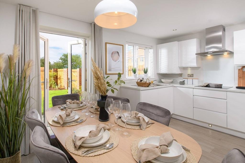 Kitchen with dining area, French doors to rear...