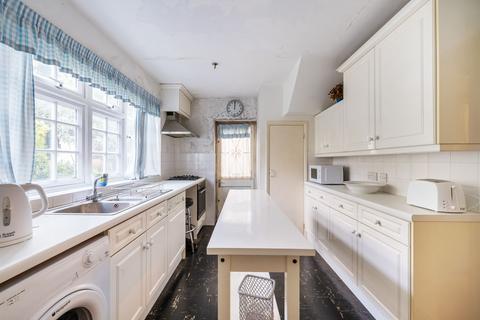 59 Downs Road, Epsom, KT18 5JT