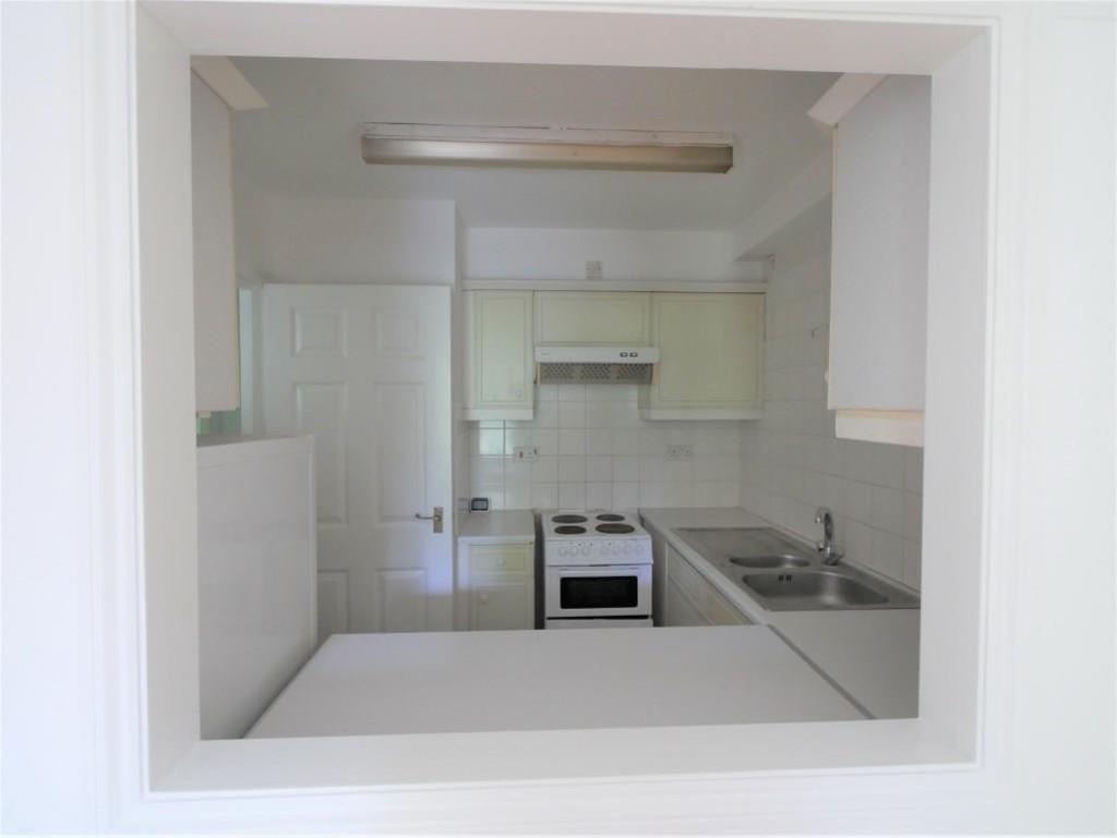 Kitchen through serving opening