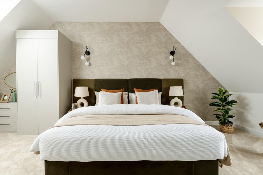 A showstopping main bedroom with tall ceilings