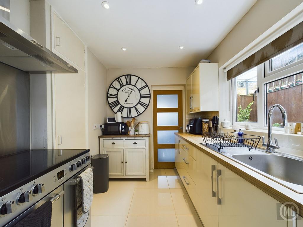 Kitchen leading into Utility