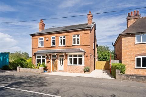 A four bedroom semi-detached house on Warwick Road, Knowle, Solihull