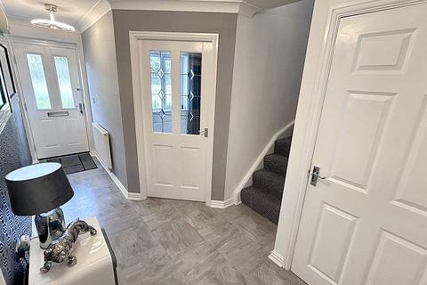 26 Rothbury Drive, Ashington, NE63 8TQ